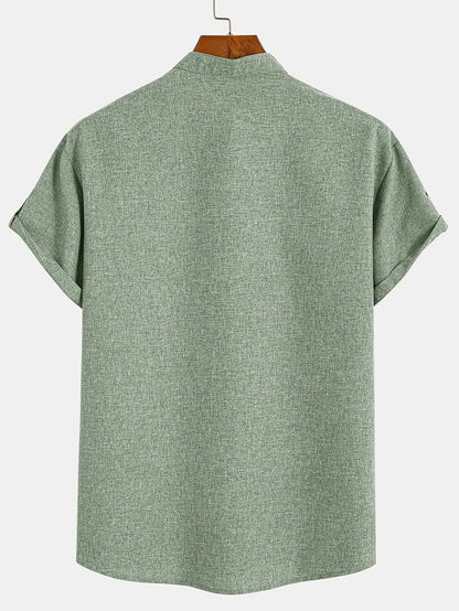 Camisa elegante de manga corta y cuello alto