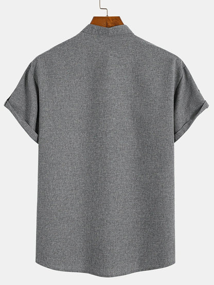 Camisa elegante de manga corta y cuello alto